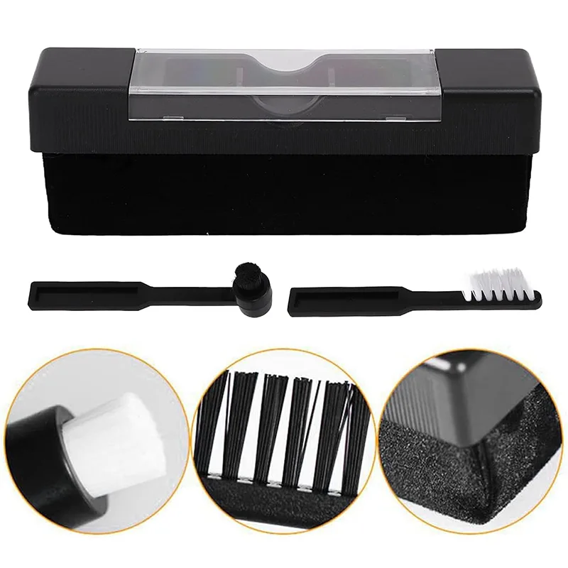 Close-up of the black velvet face and of the black and white bristle heads of the two small brushes