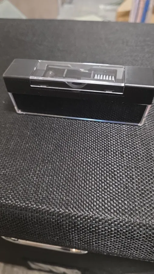 Buyer photo of the three-piece record cleaning set out of its box