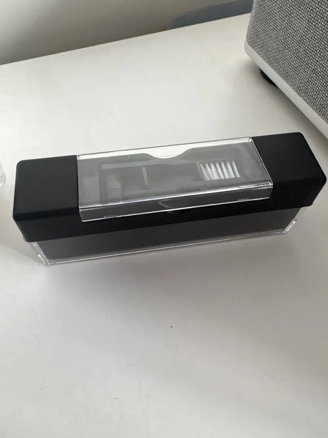 Buyer photo of the cleaning set held in one hand